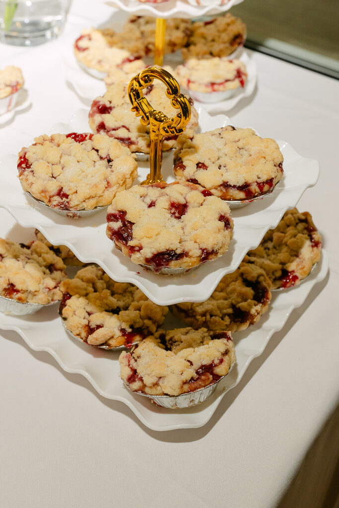 Wedding dessert table with Door County cherry pie at a wedding reception
