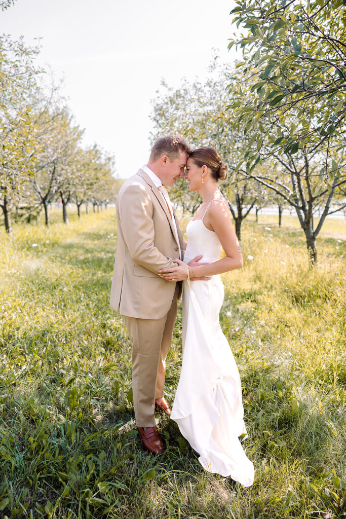 Bride and groom sharing a quiet moment during their Door County wedding day