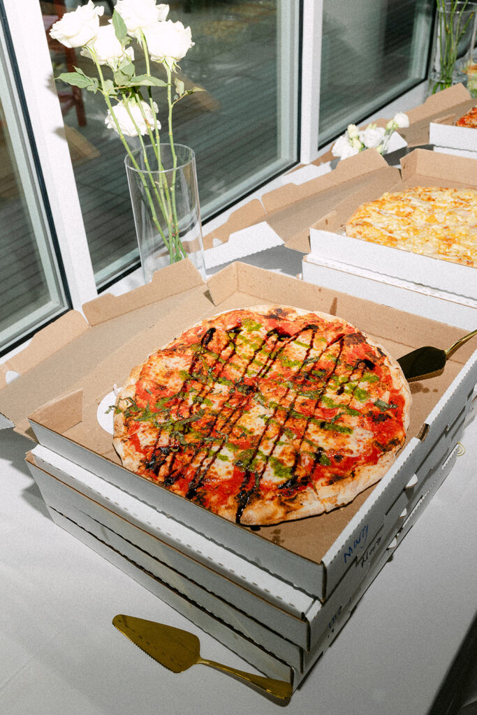 Pizza served during a fun, non-traditional Door County wedding reception