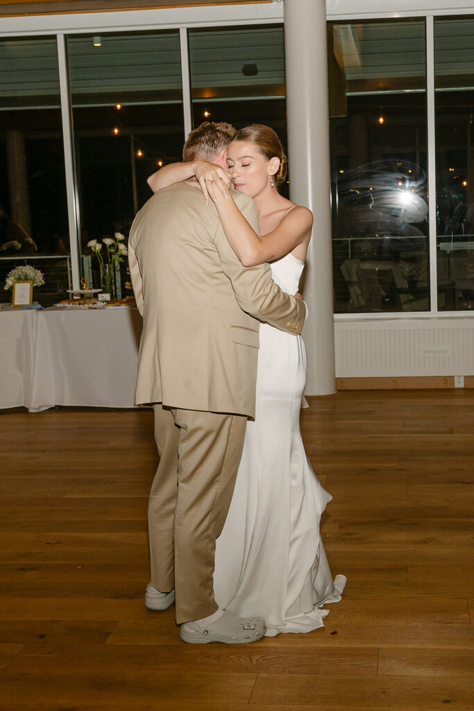 Bride and groom sharing their first dance during a relaxed Door County wedding reception