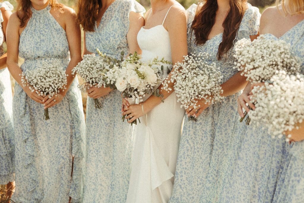 Bridesmaids holding bouquets after a Door County wedding ceremony