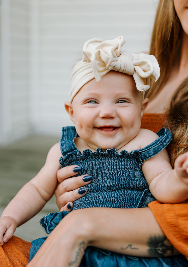 Close-up of a child's expression during a fall family photo session on a Door County farm