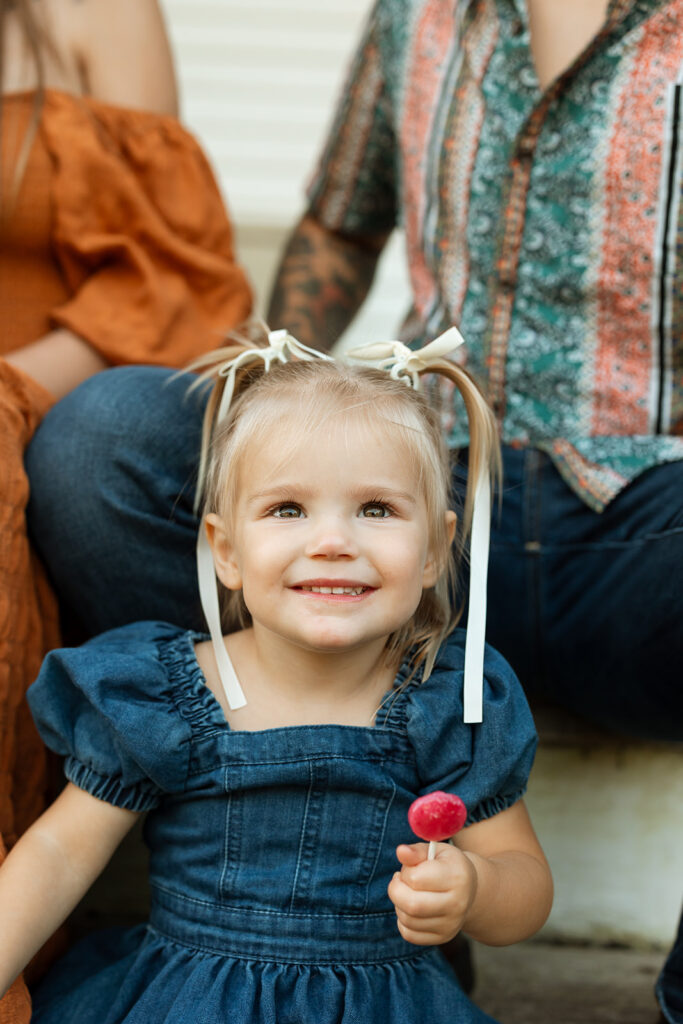 Close-up of a child's expression during a fall family photo session on a Door County farm